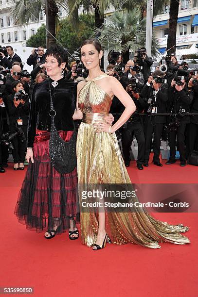 Berenice Marlohe and guest at the premiere for "Vous n'avez encore rien vu" during the 65th Cannes International Film Festival.