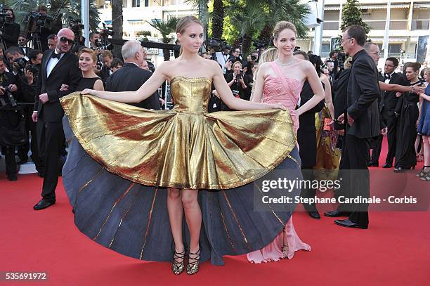 Olga Sorokina and Laura Weissbecker at the premiere for "The Paperboy" during the 65th Cannes International Film Festival.