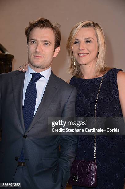 Renaud Capucon and Laurence Ferrari attend the Christian Dior Haute-Couture show as part of Paris Fashion Week Fall / Winter 2013.