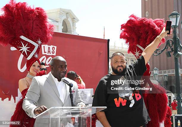 Model Jennifer Autry claps as Las Vegas City Councilman Ricki Barlow introduces DJ Khaled during a launch event for the Las Vegas official Snapchat...