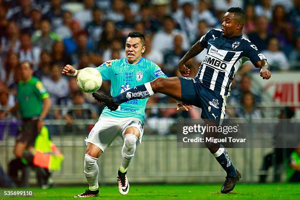 Dorlan Pabon of Monterrey fights for the ball with Emmanuel Garcia of Pachuca during the Final second leg match between Monterrey and Pachuca as...