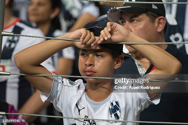 Boy fan of Monterrey cries at the end of the Final second leg match between Monterrey and Pachuca as part of the Clausura 2016 Liga MX at BBVA...