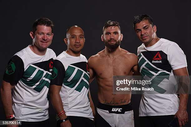 Jeremy Stephens poses for a post fight portrait with his team backstage during the UFC Fight Night Event inside the Mandalay Bay Events Center on May...