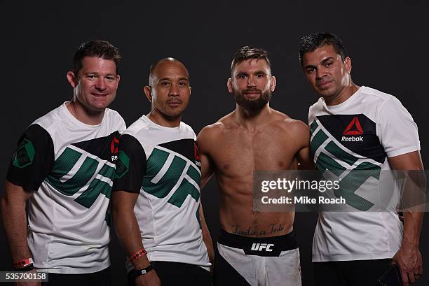 Jeremy Stephens poses for a post fight portrait with his team backstage during the UFC Fight Night Event inside the Mandalay Bay Events Center on May...