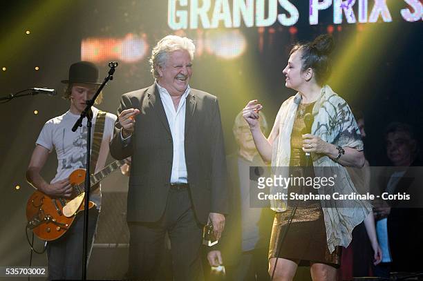 Roland Magdane and Catherine Ringer onstage during the Grands Prix Sacem 2012 Ceremony, at the Casino de Paris in Paris