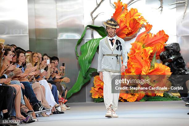 Designer John Galliano walks the runway at the end of the Christian Dior show, as part of the Paris Haute Couture Fashion Week Fall/Winter 2010-2011,...