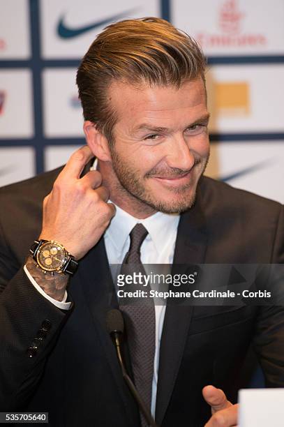 International soccer player David Beckham attends the press conference for his PSG signing at Parc des Princes, in Paris.