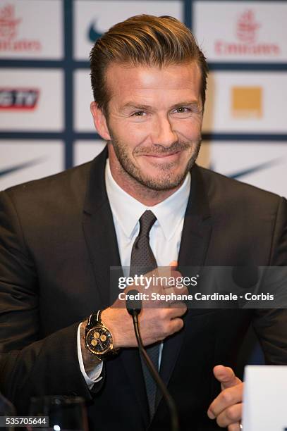 International soccer player David Beckham attends the press conference for his PSG signing at Parc des Princes, in Paris.