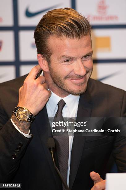 International soccer player David Beckham attends the press conference for his PSG signing at Parc des Princes, in Paris.