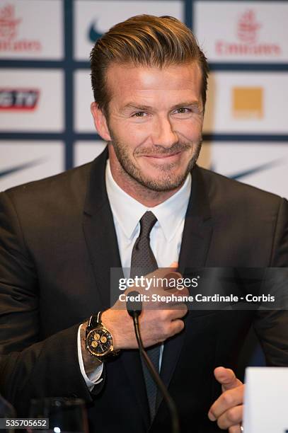 International soccer player David Beckham attends the press conference for his PSG signing at Parc des Princes, in Paris.