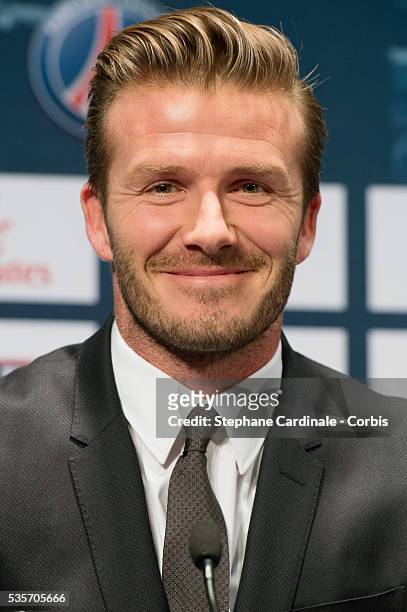International soccer player David Beckham attends the press conference for his PSG signing at Parc des Princes, in Paris.