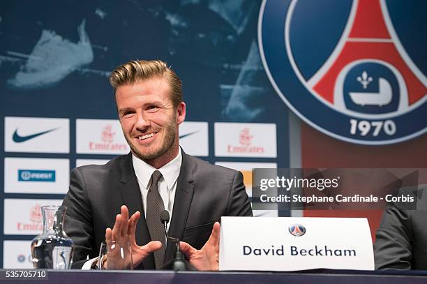 International soccer player David Beckham attends the press conference for his PSG signing at Parc des Princes, in Paris.