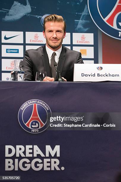 International soccer player David Beckham attends the press conference for his PSG signing at Parc des Princes, in Paris.