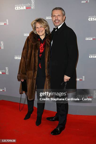 Lambert Wilson and guest arrive at Cesar Film Awards 2013 at Theatre du Chatelet, in Paris.