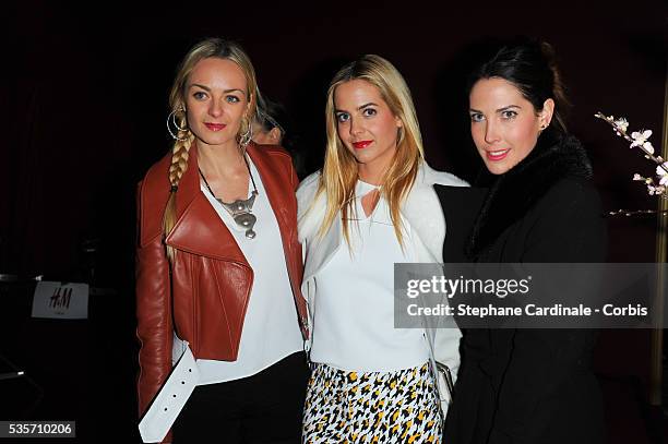 Virginie Courtin-Clarins, Jenna Courtin-Clarins and Prisca Courtin-Clarins attend the H&M Fashion Show Fall/Winter 2013 Ready-to-Wear show as part of...