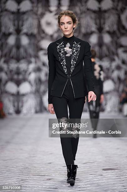 Model walks the runway during the Viktor&Rolf Fall/Winter 2013/14 Ready-to-Wear show as part of Paris Fashion Week, in Paris