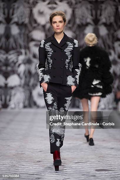 Model walks the runway during the Viktor&Rolf Fall/Winter 2013/14 Ready-to-Wear show as part of Paris Fashion Week, in Paris