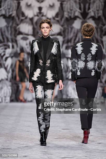 Model walks the runway during the Viktor&Rolf Fall/Winter 2013/14 Ready-to-Wear show as part of Paris Fashion Week, in Paris