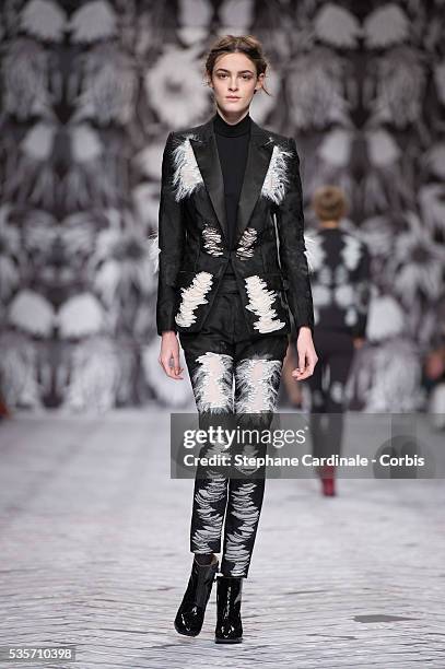 Model walks the runway during the Viktor&Rolf Fall/Winter 2013/14 Ready-to-Wear show as part of Paris Fashion Week, in Paris