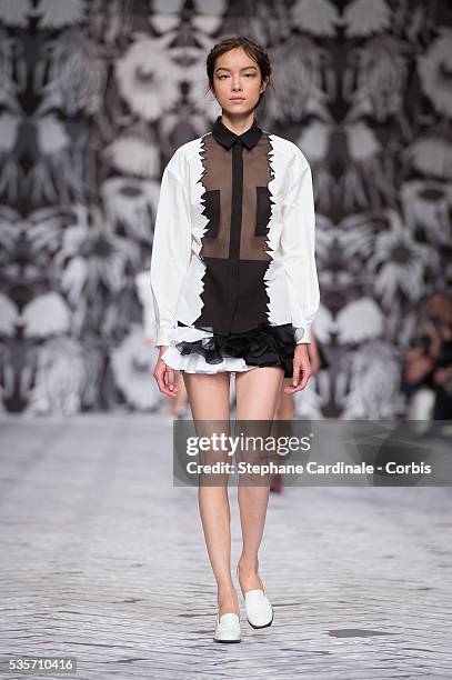 Model walks the runway during the Viktor&Rolf Fall/Winter 2013/14 Ready-to-Wear show as part of Paris Fashion Week, in Paris