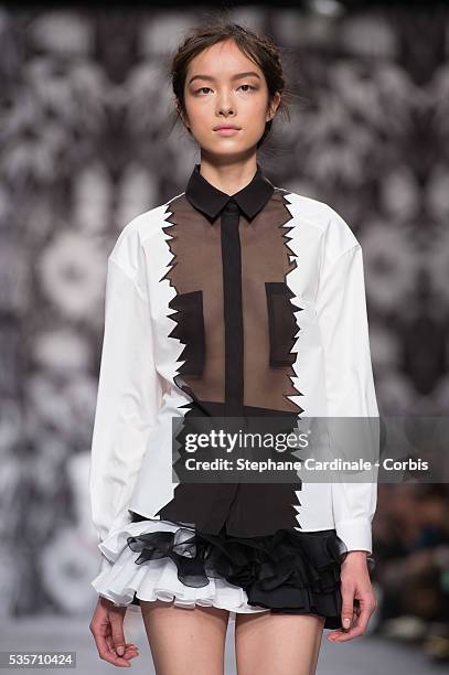 Model walks the runway during the Viktor&Rolf Fall/Winter 2013/14 Ready-to-Wear show as part of Paris Fashion Week, in Paris