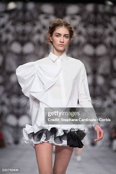 Model walks the runway during the Viktor&Rolf Fall/Winter 2013/14 Ready-to-Wear show as part of Paris Fashion Week, in Paris