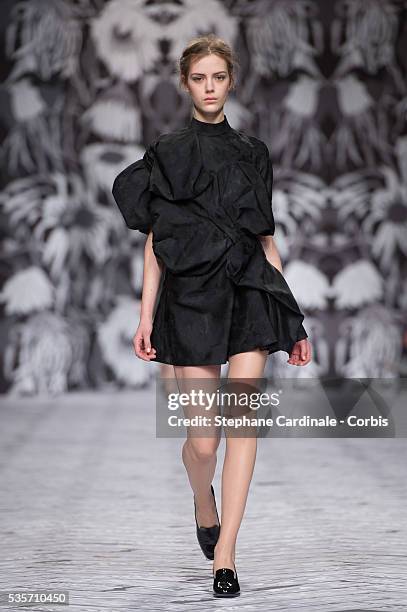 Model walks the runway during the Viktor&Rolf Fall/Winter 2013/14 Ready-to-Wear show as part of Paris Fashion Week, in Paris