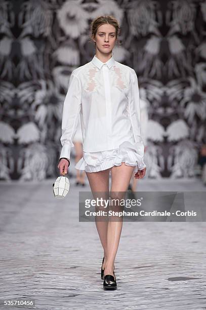 Model walks the runway during the Viktor&Rolf Fall/Winter 2013/14 Ready-to-Wear show as part of Paris Fashion Week, in Paris