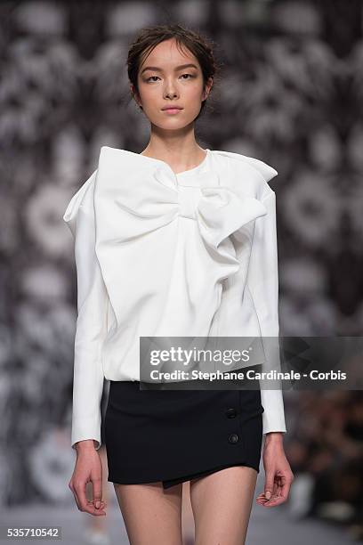 Model walks the runway during the Viktor&Rolf Fall/Winter 2013/14 Ready-to-Wear show as part of Paris Fashion Week, in Paris