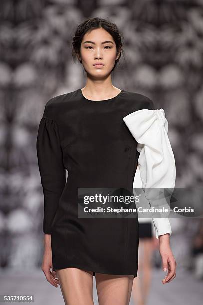 Model walks the runway during the Viktor&Rolf Fall/Winter 2013/14 Ready-to-Wear show as part of Paris Fashion Week, in Paris