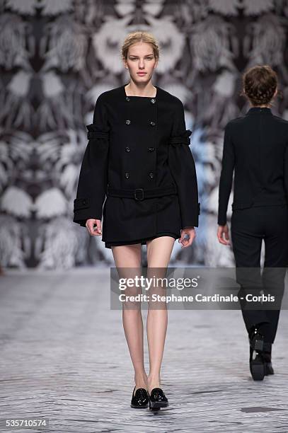 Model walks the runway during the Viktor&Rolf Fall/Winter 2013/14 Ready-to-Wear show as part of Paris Fashion Week, in Paris