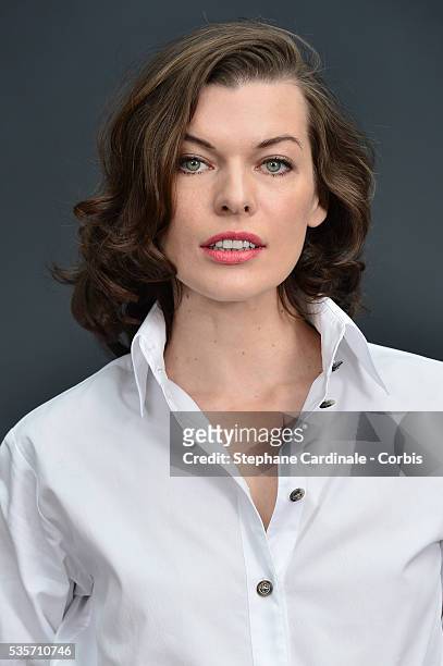 Milla Jovovich attends the Chanel Fall/Winter 2013/14 Ready-to-Wear show as part of Paris Fashion Week at Grand Palais, in Paris.