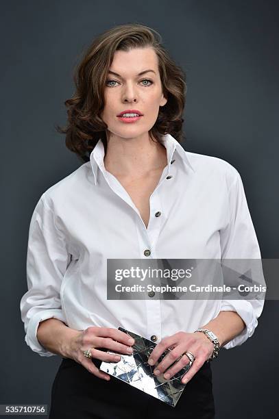 Milla Jovovich attends the Chanel Fall/Winter 2013/14 Ready-to-Wear show as part of Paris Fashion Week at Grand Palais, in Paris.