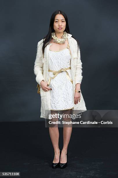 Yi Zhou attends the Chanel Fall/Winter 2013/14 Ready-to-Wear show as part of Paris Fashion Week at Grand Palais, in Paris.