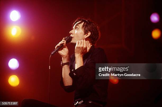 Jarvis Cocker of Pulp performs on stage, United Kingdom, 1995.