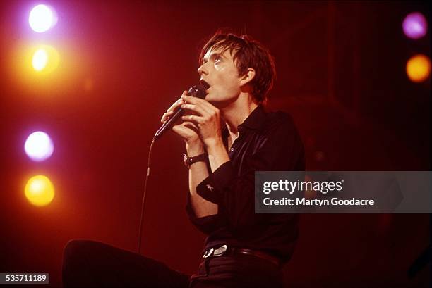 Jarvis Cocker of Pulp performs on stage, United Kingdom, 1995.