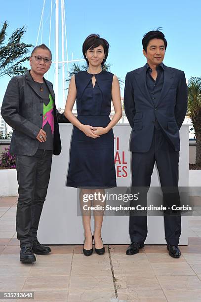 Director Takashi Mike, actress Nanako Matsushima and actor Takao Osawa attend the 'Wara No Tate' photo call during the 66th Cannes International Film...