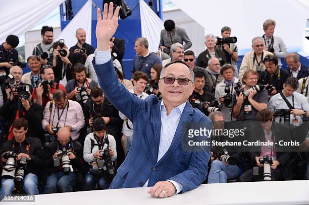 Director Johnnie To attends the 'Blind Detective' photo call during the 66th Cannes International Film Festival.