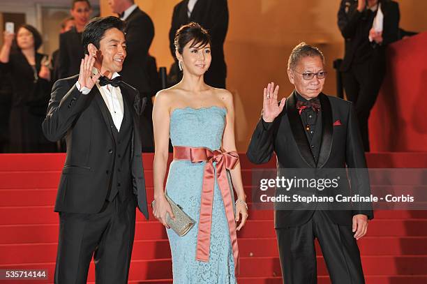 Actor Takashi Miike, actress Nanako Matsushima and Director Takao Osawa attend the 'Wara No Tate' premiere during the 66th Cannes International Film...
