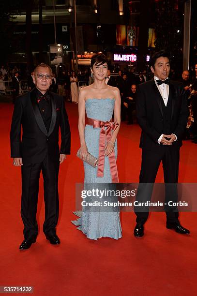 Director Takao Osawa, actress Nanako Matsushima and Actor Takashi Miike attend the 'Wara No Tate' premiere during the 66th Cannes International Film...