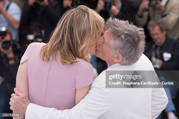 Emmanuelle Seigner and Director Roman Polanski attend the 'La Venus A La Fourrure' photo call during the 66th Cannes International Film Festival.