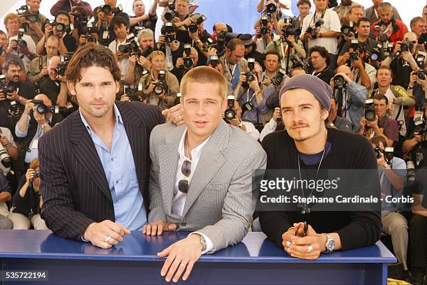 Co-stars of the Wolfgang Petersen film "Troy" Eric Bana, Brad Pitt and Orlando Bloom attend the photocall at the 2004 Cannes Film Festival. The film...
