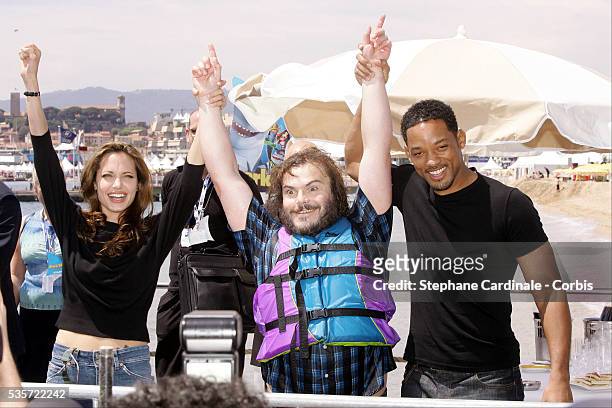 Voice actors Angelina Jolie, Jack Black and Will Smith attend a photocall for Bibo Bergeron and Vicky Jenson's animation movie "Shark Tale", at the...