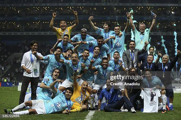 Players of Pachuca celebrate victory with the trophy after winning the Final second leg match of the Clausura 2016 Liga MX against Monterrey, at BBVA...