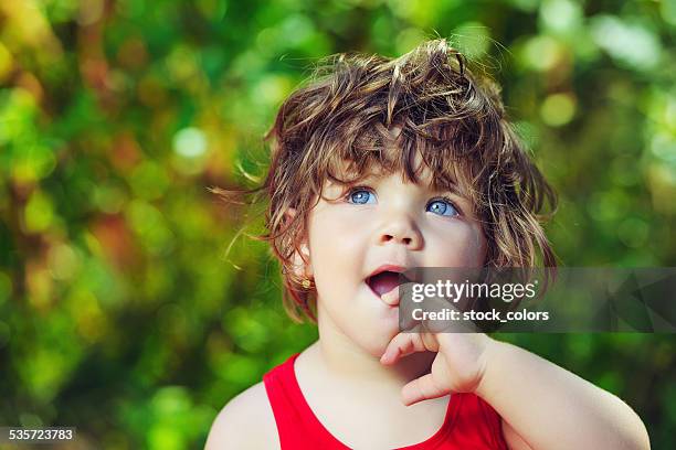 baby thoughts - finger in mouth stock pictures, royalty-free photos & images