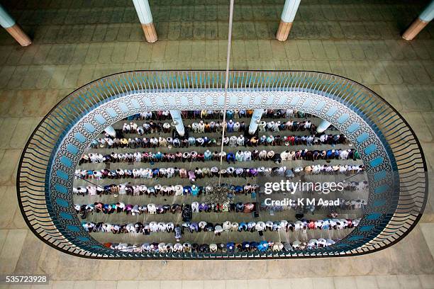 Muslims pray during a special prayer at the National Mosque of Bangladesh to mark Shab-e-Barat or 'night of forgiveness' in Dhaka, Bangladesh, May...