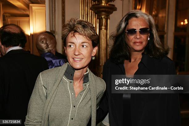 Isabelle Juppe and Betty Lagardere attend an award ceremony for actor Michel Serrault after he was presented with the "Chevalier de l'Ordre National...