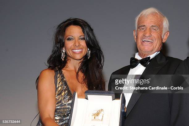 Barbara Gandolfi and Jean-Paul Belmondo attend the "Tribute to Jean-Paul Belmondo" during the 64th Cannes International Film Festival.