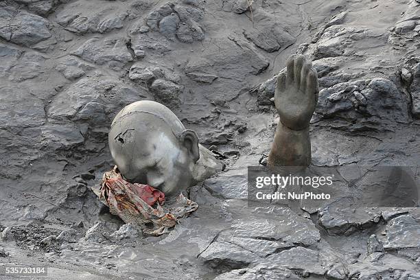 Survivors statues created by Dadang Christianto, an Indonesian sculpture are displayed at mudflow areas to signify the lives of victims who suffered...