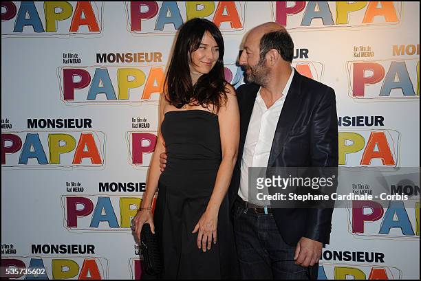 Kad Merad with his Wife Emmanuelle Cosso attend the premiere of "Monsieur Papa", in Paris.